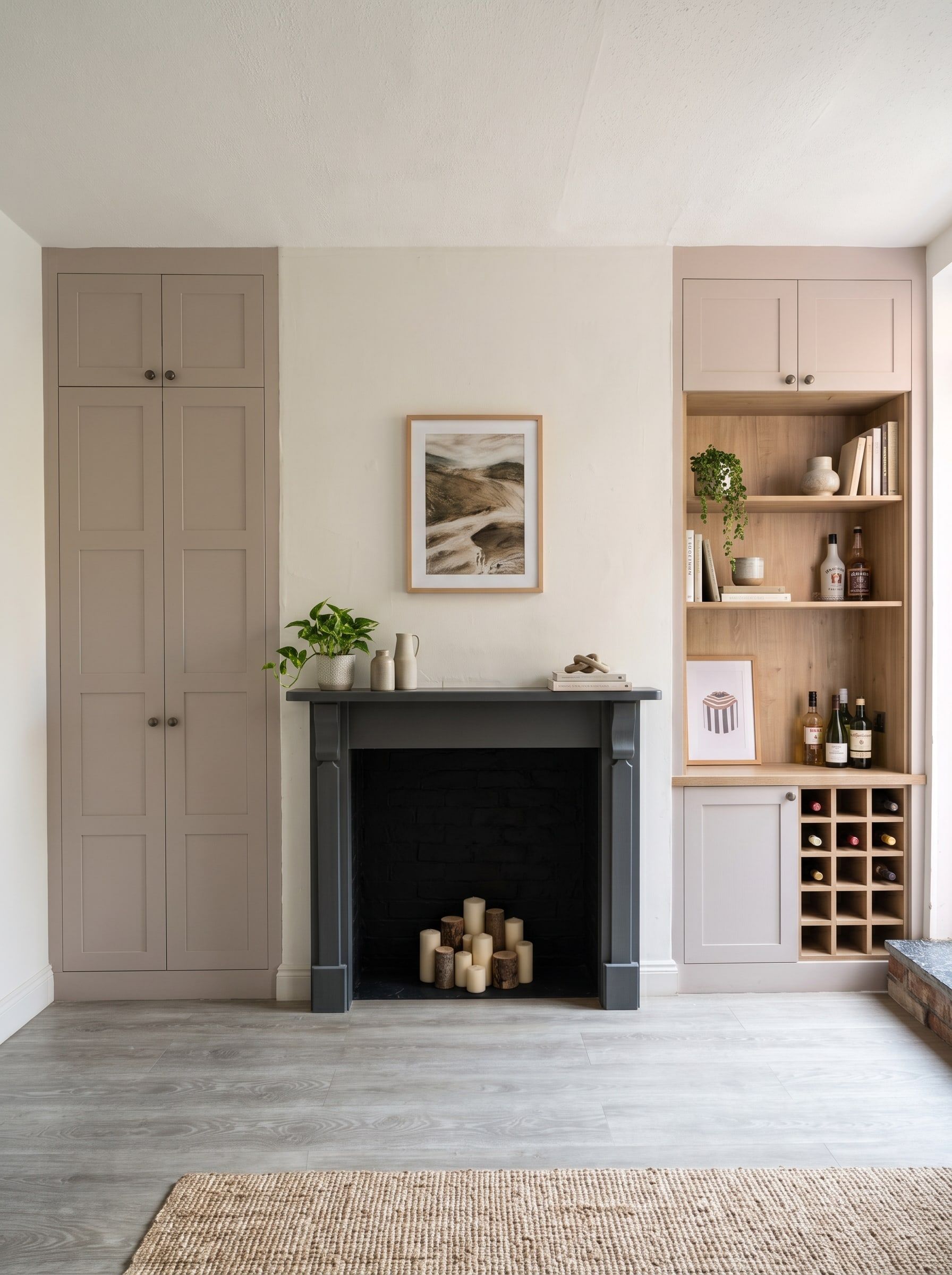 Cashmere 4-panel Contemporary Shaker alcove units either side of a chimney breast in a dining room in Mountsorrel, with a tall cupboard on the left and open oak-effect shelves and a wine rack on the right